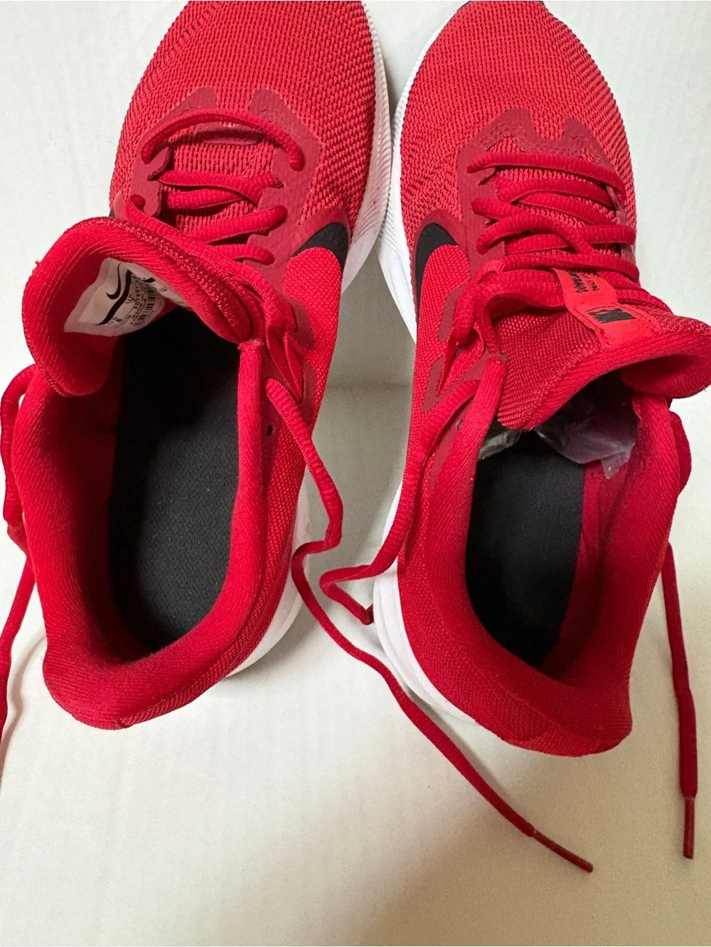 Nike Men’s Red Athletic Running Shoes with Black Swoosh